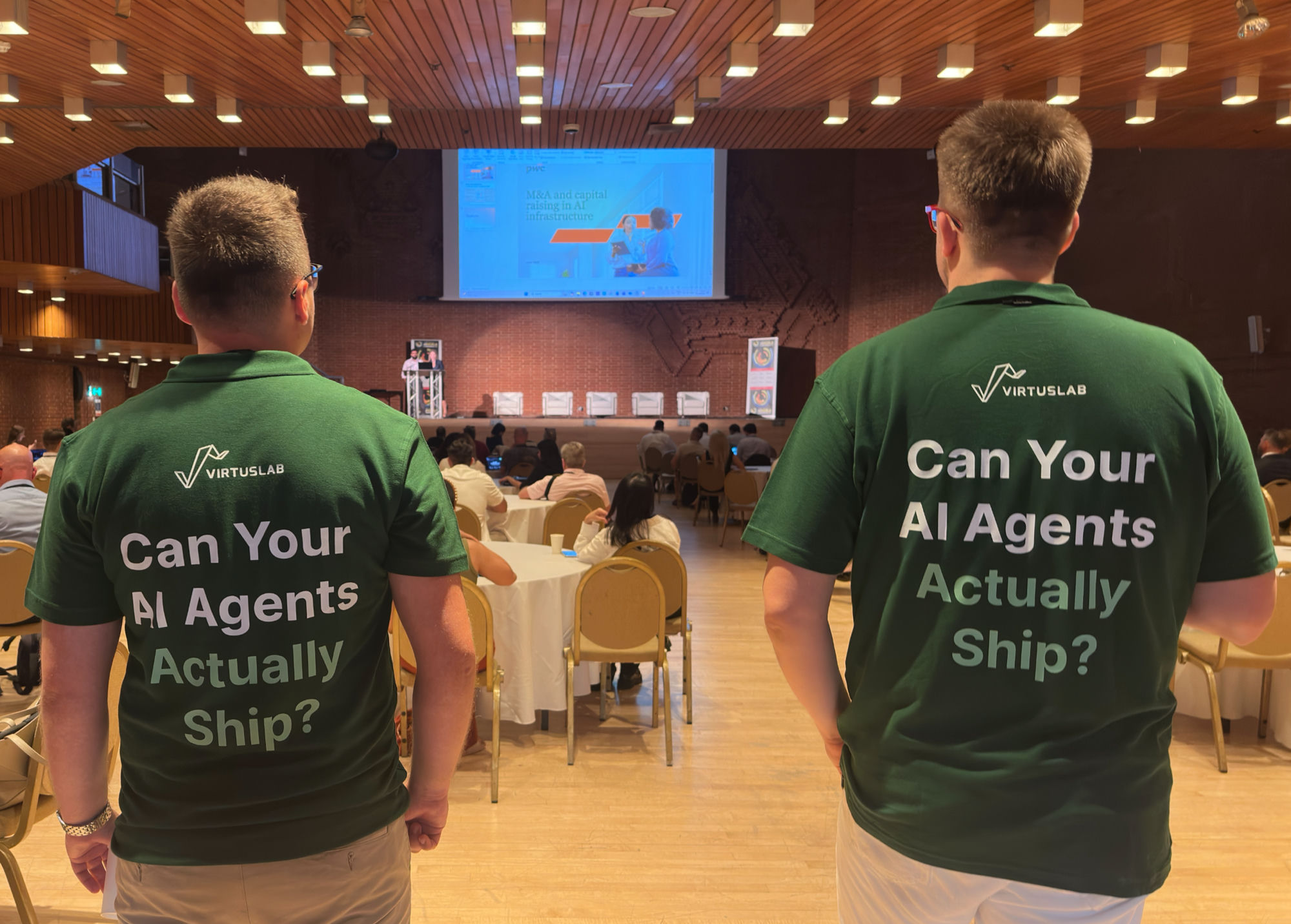 VirtusLab engineers at an AI infrastructure conference, in Can Your AI Agents Actually Ship shirts.